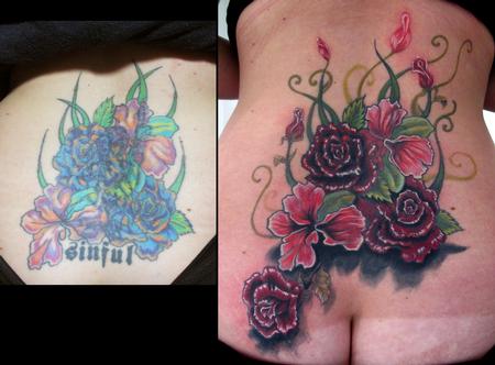 Stefano Alcantara - lower back flower coverup tattoo